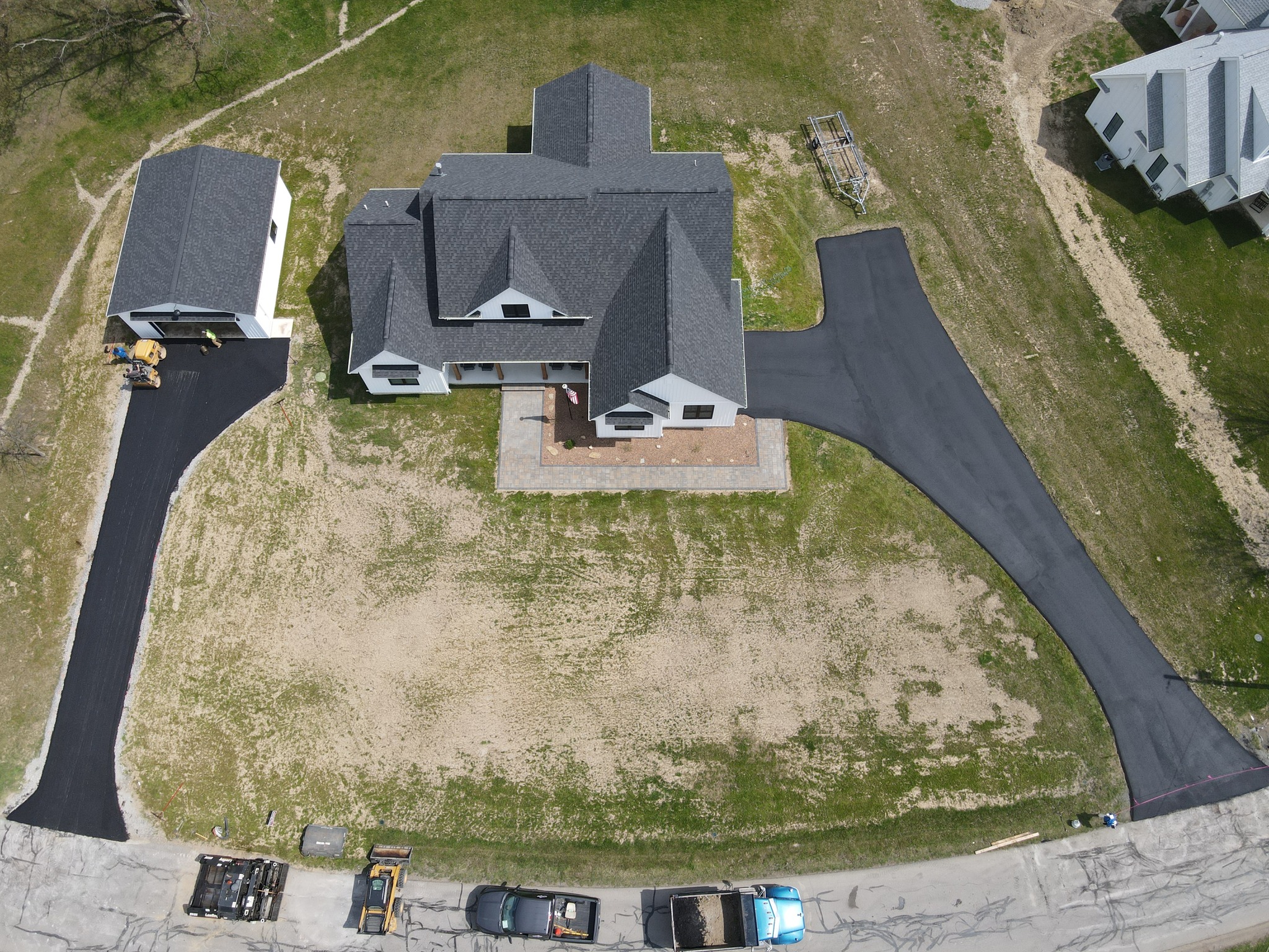 Two Driveways, One Seamless Solution: Asphalt Paving for a New Butler, PA Property