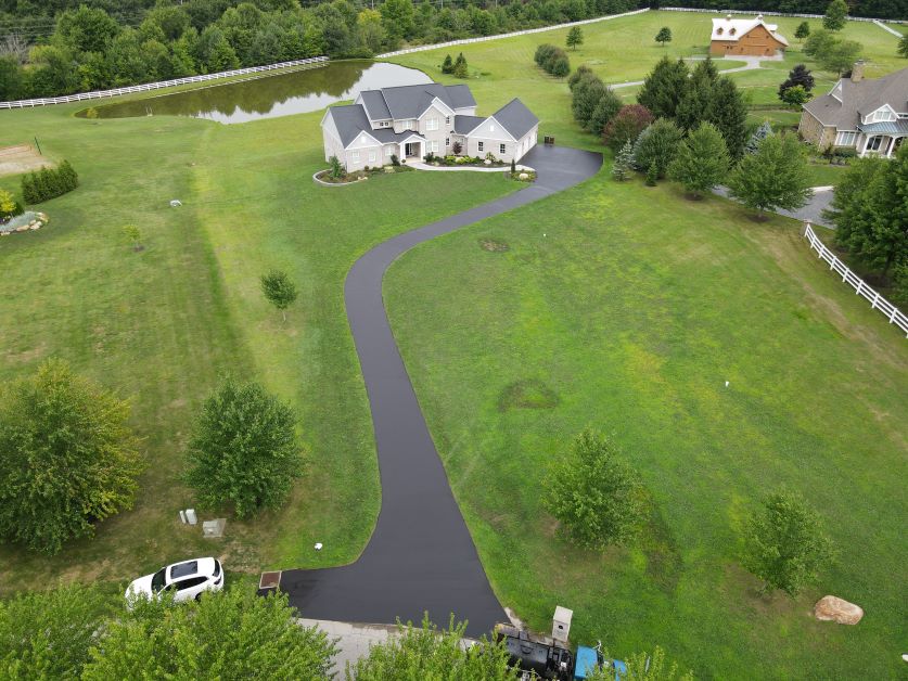 Rolling Smooth: Crafting a Curved Driveway That Elevates Country Charm in Butler, PA